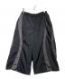 COOTIE PRODUCTIONS（クーティープロダクツ）の古着「Nylon Paneling Shin Cut Wide Track Pants」｜ブラック×グレー