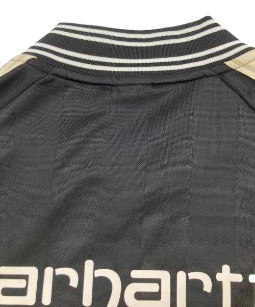 F.C.R.B.（エフシーレアルブリストル）F.C.R.B. (エフシーレアルブリストル) Carhartt WIP (カーハート ワーク イン プログレス) VARSITY TRACK JACKET ブラック×アイボリー サイズ:Mの古着・服飾アイテム
