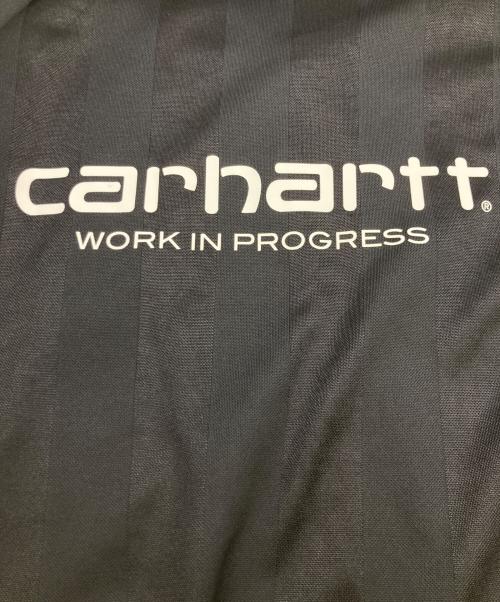 F.C.R.B.（エフシーレアルブリストル）F.C.R.B. (エフシーレアルブリストル) Carhartt WIP (カーハート ワーク イン プログレス) VARSITY TRACK JACKET ブラック×アイボリー サイズ:Mの古着・服飾アイテム