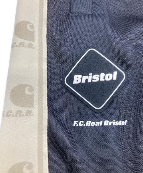 F.C.R.B.（エフシーレアルブリストル）F.C.R.B. (エフシーレアルブリストル) Carhartt WIP (カーハート ワーク イン プログレス) TRACK PANTS ブラック×アイボリー サイズ:Mの古着・服飾アイテム