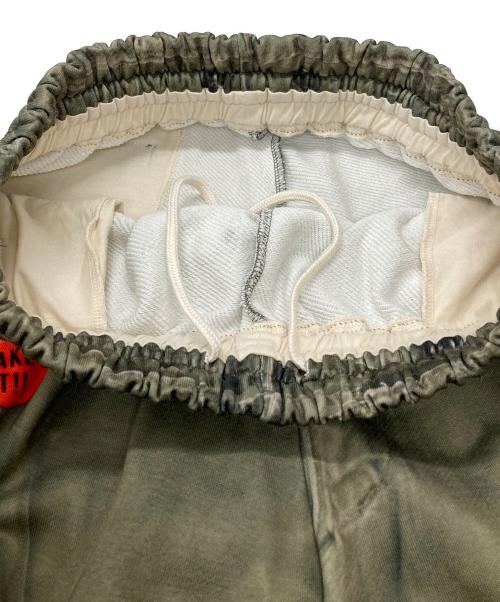 TOY DEVIL（トイデビル）TOY DEVIL (トイデビル) TRANSFER PRINT SWEAT PANTS/転写プリントスウェットパンツ オリーブ サイズ:1の古着・服飾アイテム