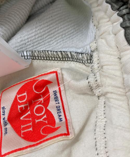 TOY DEVIL（トイデビル）TOY DEVIL (トイデビル) TRANSFER PRINT SWEAT PANTS/転写プリントスウェットパンツ オリーブ サイズ:1の古着・服飾アイテム