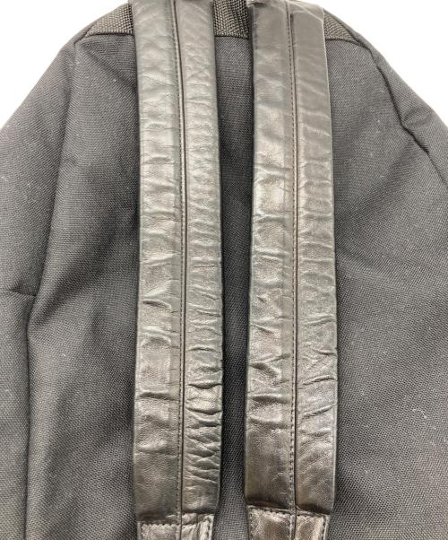 COMME des GARCONS（コムデギャルソン）COMME des GARCONS (コムデギャルソン) レザーストラップバックパック ブラックの古着・服飾アイテム