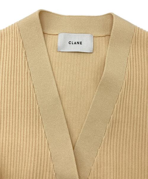 CLANE（クラネ）CLANE (クラネ) CURVE SLEEVE KNIT CARDIGAN イエロー サイズ:Mの古着・服飾アイテム