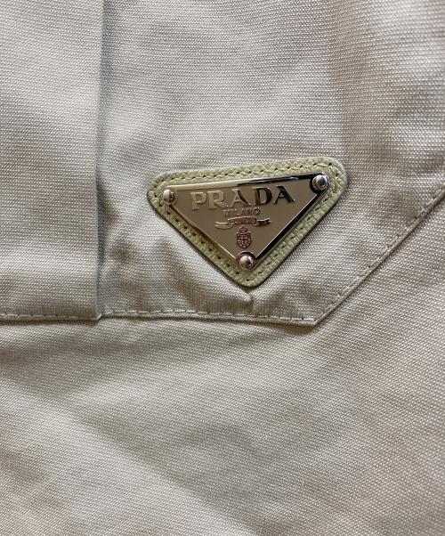 PRADA（プラダ）PRADA (プラダ) トライアングルロゴカーゴスカート ベージュ サイズ:38の古着・服飾アイテム