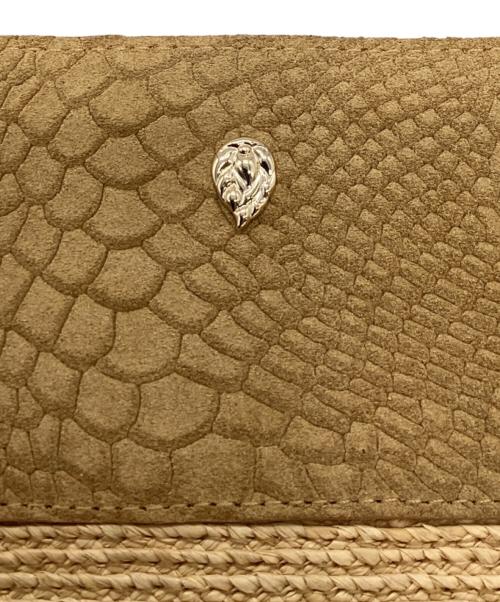 HELEN KAMINSKI（ヘレンカミンスキー）HELEN KAMINSKI (ヘレンカミンスキー) クラッチバッグ ベージュの古着・服飾アイテム