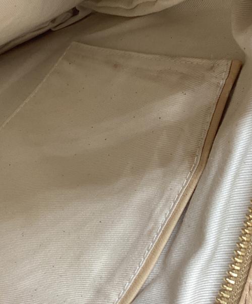 HELEN KAMINSKI（ヘレンカミンスキー）HELEN KAMINSKI (ヘレンカミンスキー) クラッチバッグ ベージュの古着・服飾アイテム