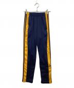 adidasアディダス）の古着「アディブレイク パンツ」｜オレンジ