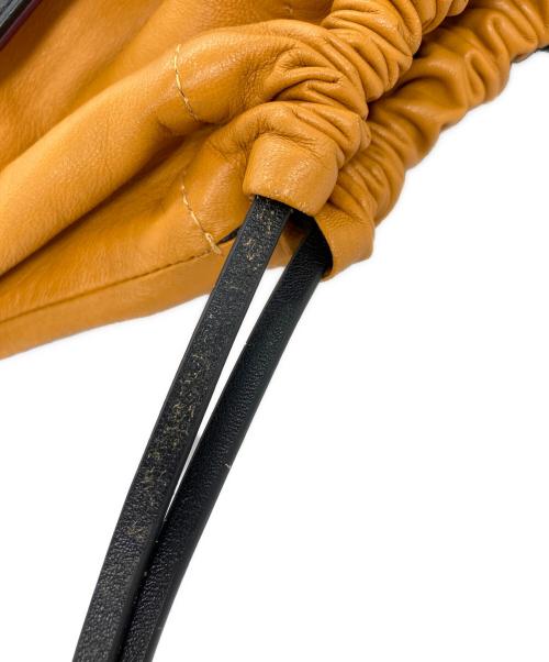 J&M DAVIDSON（ジェイ＆エム デヴィッドソン）J&M DAVIDSON (ジェイ＆エム デヴィッドソン) 巾着ショルダーバッグの古着・服飾アイテム