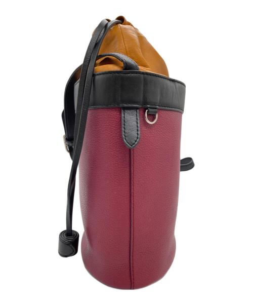 J&M DAVIDSON（ジェイ＆エム デヴィッドソン）J&M DAVIDSON (ジェイ＆エム デヴィッドソン) 巾着ショルダーバッグの古着・服飾アイテム