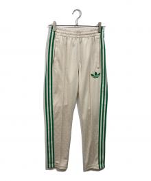 adidas（アディダス）の古着「Adicolor 70s Monogram Track Pants」｜アイボリー
