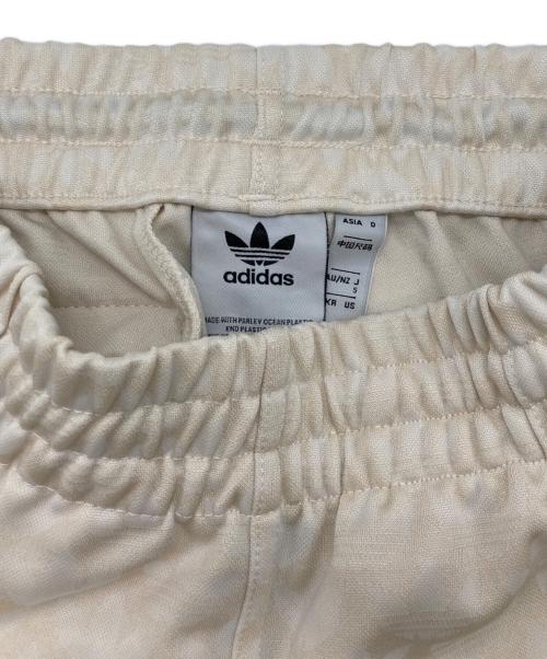 adidas（アディダス）adidas (アディダス) Adicolor 70s Monogram Track Pants アイボリー サイズ:Sの古着・服飾アイテム