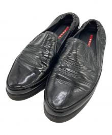PRADA SPORTS（プラダスポーツ）の古着「エナメルスリッポン」｜ブラック