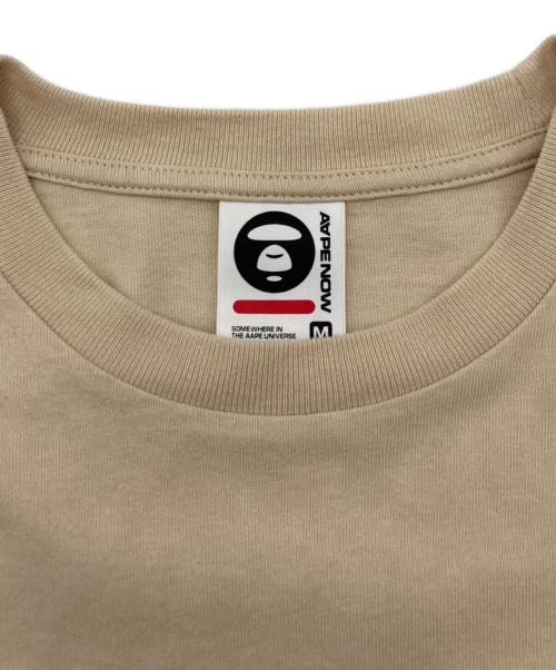 Aape BY A BATHING APE（エーエイプ バイ アベイシングエイプ）Aape BY A BATHING APE (エーエイプ バイ アベイシングエイプ) AAPE NOW TEE ベージュ サイズ:Mの古着・服飾アイテム