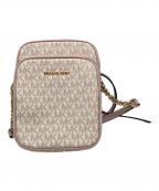 MICHAEL KORSマイケル・コース）の古着「Jet Set Travel Medium Signature Logo Crossbody Bag」｜ピンク