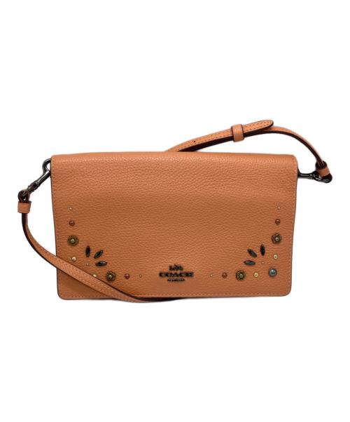 COACH（コーチ）COACH (コーチ) ヘイデン・フォールドオーバー・クロスボディ・クラッチ オレンジの古着・服飾アイテム