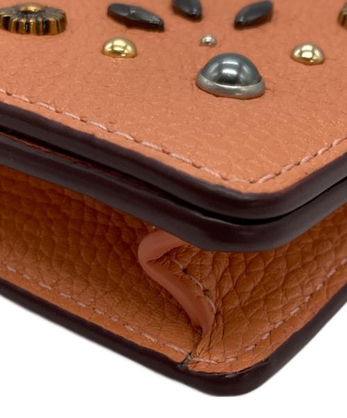 COACH（コーチ）COACH (コーチ) ヘイデン・フォールドオーバー・クロスボディ・クラッチ オレンジの古着・服飾アイテム
