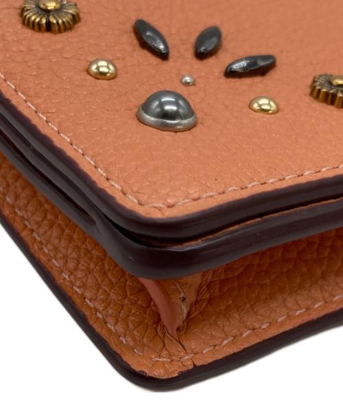 COACH（コーチ）COACH (コーチ) ヘイデン・フォールドオーバー・クロスボディ・クラッチ オレンジの古着・服飾アイテム