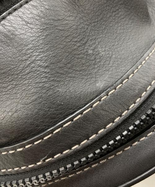 COACH（コーチ）COACH (コーチ) Academy backpack kaffe fassett ブラックの古着・服飾アイテム