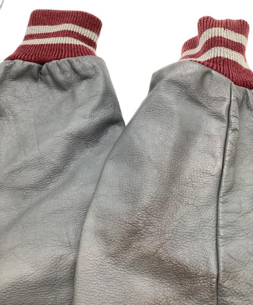skookum（スクーカム）SKOOKUM (スクーカム) スタジャン レッド サイズ:SIZE 38の古着・服飾アイテム