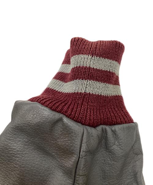 skookum（スクーカム）SKOOKUM (スクーカム) スタジャン レッド サイズ:SIZE 38の古着・服飾アイテム