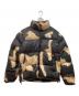 SUPREME（シュプリーム）の古着「Bleached Denim Print Nuptse Jacket」｜ブラック×ベージュ