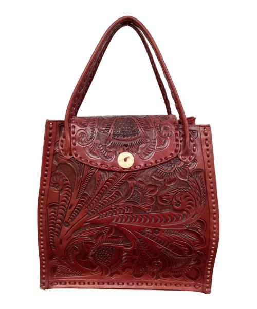 Carving Tribes（カービングトライブス）CARVING TRIBES (カービングトライブス) レザー型押しトートバッグ ブラウンの古着・服飾アイテム
