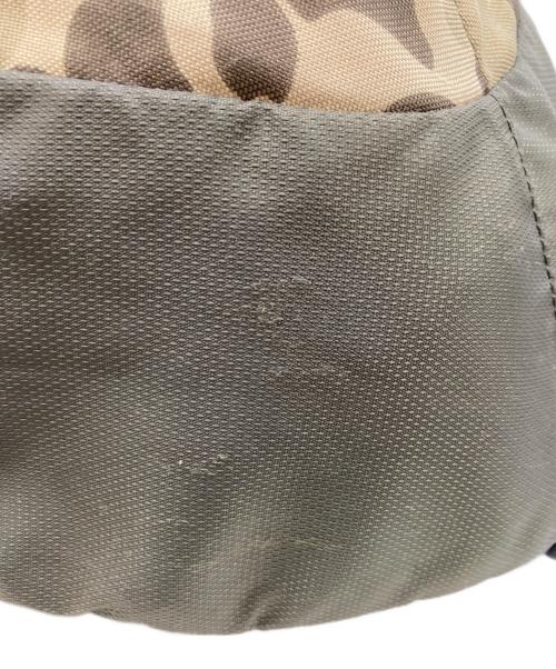Columbia（コロンビア）Columbia (コロンビア) カモ柄スリングバッグ オレンジ×カーキの古着・服飾アイテム