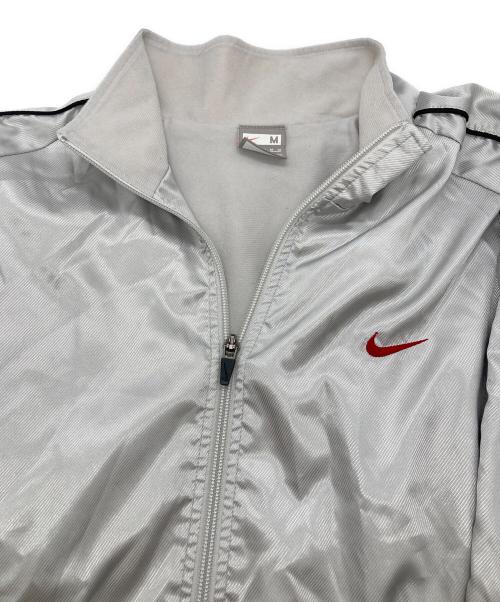 NIKE（ナイキ）NIKE (ナイキ) ジップアップジャケット シルバー サイズ:Ｍの古着・服飾アイテム