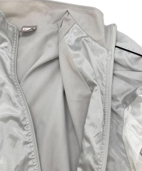 NIKE（ナイキ）NIKE (ナイキ) ジップアップジャケット シルバー サイズ:Ｍの古着・服飾アイテム