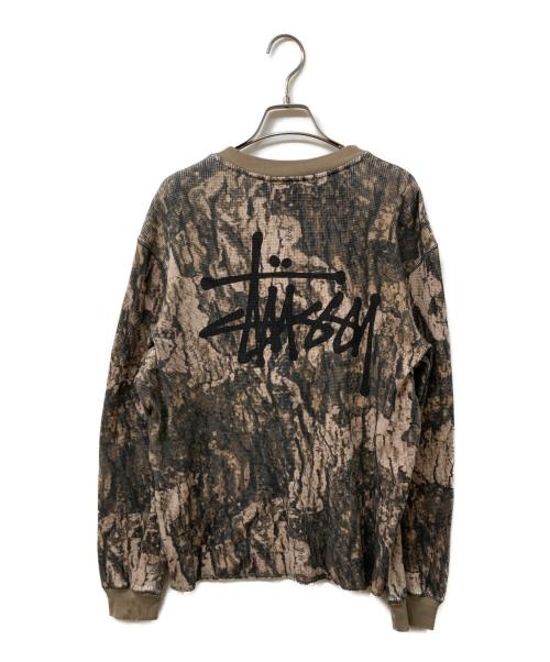 stussy（ステューシー）stussy (ステューシー) ストックロゴ リアルツリーカモ サーマル 長袖カットソー カーキ サイズ:SIZE Mの古着・服飾アイテム