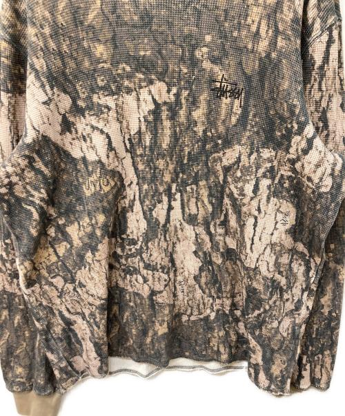 stussy（ステューシー）stussy (ステューシー) ストックロゴ リアルツリーカモ サーマル 長袖カットソー カーキ サイズ:SIZE Mの古着・服飾アイテム