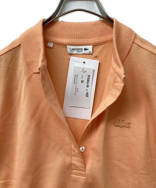 LACOSTE（ラコステ）LACOSTE (ラコステ) ストレッチコットンピケポロシャツ オレンジ サイズ:36の古着・服飾アイテム