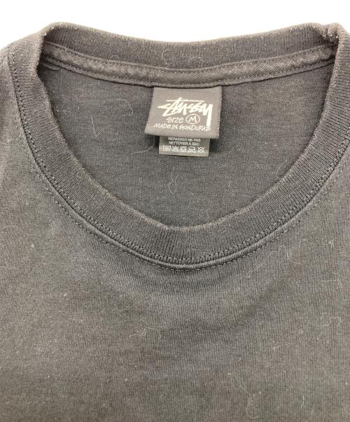 stussy（ステューシー）stussy (ステューシー) TOUGHGEAR プリントＴシャツ ブラック サイズ:Mの古着・服飾アイテム
