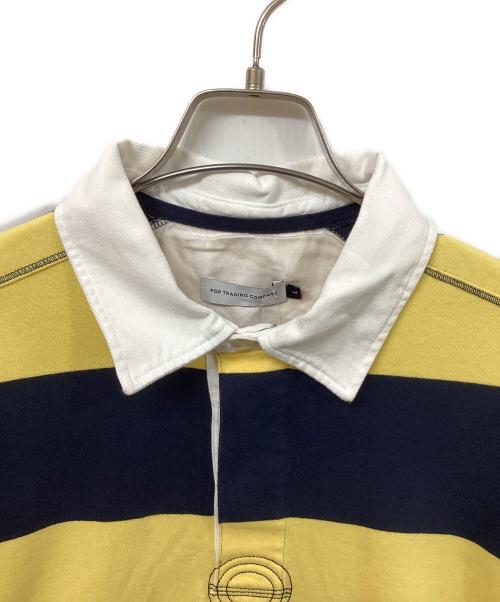POP TRADING COMPANY（ポップトレーディングカンパニー）POP TRADING COMPANY (ポップトレーディングカンパニー) ポロシャツ イエロー×ネイビー サイズ:	SIZE Lの古着・服飾アイテム