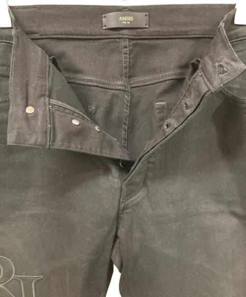 AMIRI（アミリ）AMIRI (アミリ) Staggered Logoブラックデニム ブラック サイズ:SIZE 91cm (W36)の古着・服飾アイテム
