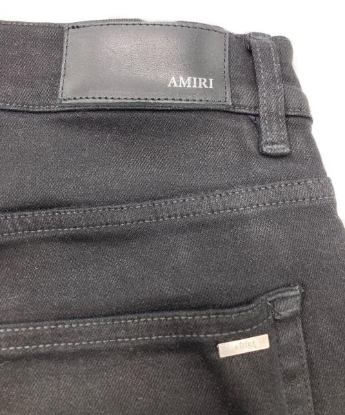 AMIRI（アミリ）AMIRI (アミリ) Staggered Logoブラックデニム ブラック サイズ:SIZE 91cm (W36)の古着・服飾アイテム