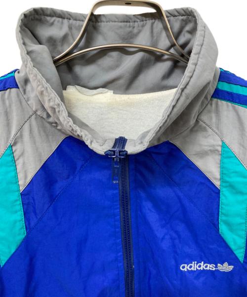 adidas（アディダス）adidas (アディダス) ナイロンジャケット グレー×ブルー サイズ:	SIZE XLの古着・服飾アイテム