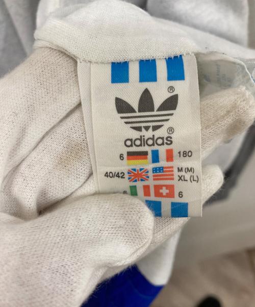 adidas（アディダス）adidas (アディダス) ナイロンジャケット グレー×ブルー サイズ:	SIZE XLの古着・服飾アイテム