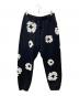 Denim Tears（デニムティアーズ）の古着「The Cotton Wreath Sweatpants」｜ブラック