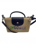 LONGCHAMPロンシャン）の古着「ショルダーバッグ」｜ベージュ×ネイビー