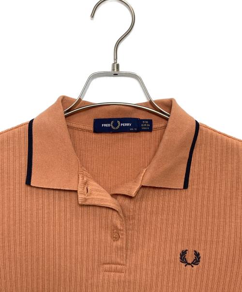 FRED PERRY（フレッドペリー）FRED PERRY (フレッドペリー) ポロシャツ オレンジ サイズ:UK10の古着・服飾アイテム