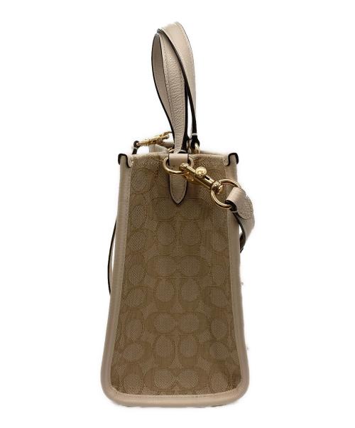 COACH（コーチ）COACH (コーチ) デンプシー キャリーオール 2wayバッグ　CQ877 ベージュの古着・服飾アイテム