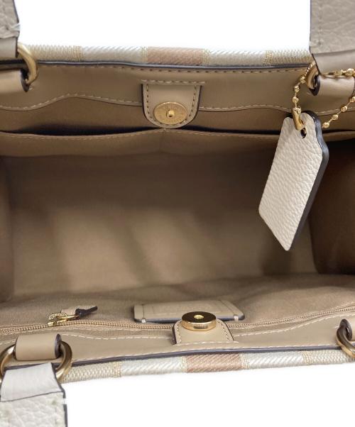 COACH（コーチ）COACH (コーチ) デンプシー キャリーオール 2wayバッグ　CQ877 ベージュの古着・服飾アイテム