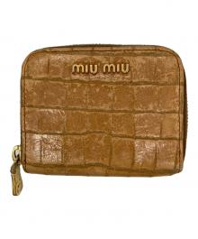 MIU MIU（ミュウミュウ）の古着「型押しラウンドジップウォレット」｜ベージュ