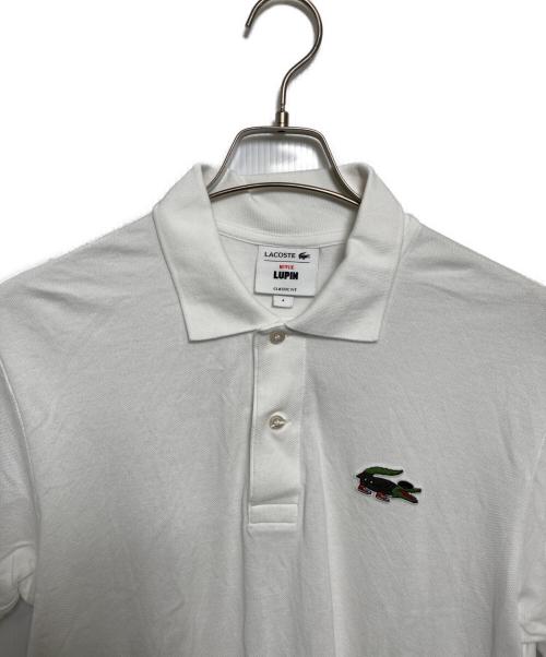 LACOSTE（ラコステ）LACOSTE (ラコステ) NETFLIX (ネットフリックス) ポロシャツ ホワイト サイズ:4の古着・服飾アイテム