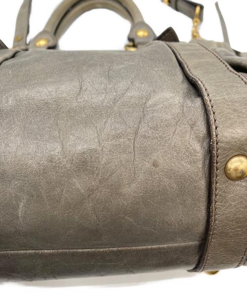 MIU MIU（ミュウミュウ）MIU MIU (ミュウミュウ) ヴィッテロルクス2WAYバッグ グレーの古着・服飾アイテム