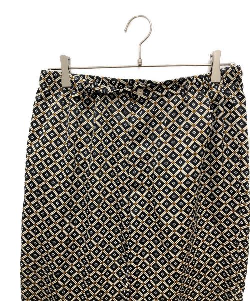 SUPREME（シュプリーム）SUPREME (シュプリーム) 総柄サテンパンツ ブラック×ベージュ サイズ:Sの古着・服飾アイテム