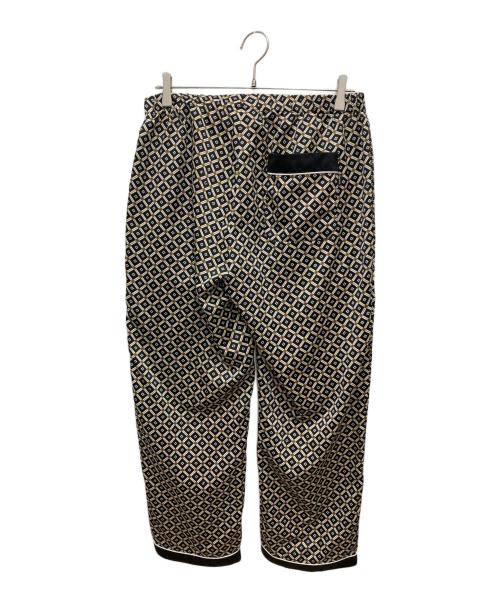 SUPREME（シュプリーム）SUPREME (シュプリーム) 総柄サテンパンツ ブラック×ベージュ サイズ:Sの古着・服飾アイテム