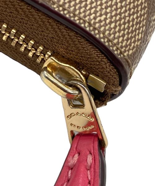 COACH（コーチ）COACH (コーチ) 2つ折り財布 ブラウンの古着・服飾アイテム